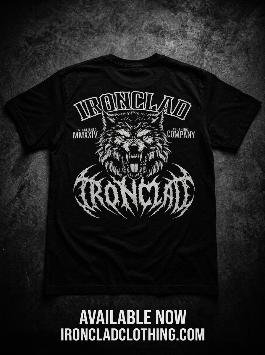 Promotional flat lay of the black Ironclad Iron-Wolf tee with a white wolf back graphic